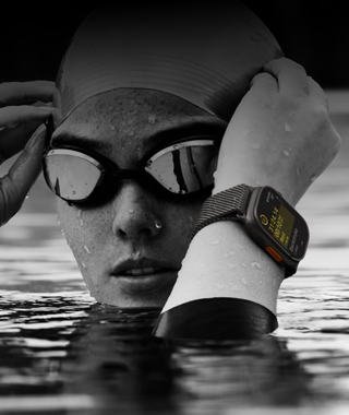 Ultra 2 on the wrist of a swimmer in a pool