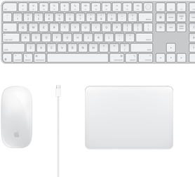 Vue d’un bureau sur lequel sont placés une Magic Mouse, un câble USB‑C, un Magic Trackpad et un Magic Keyboard avec pavé numérique